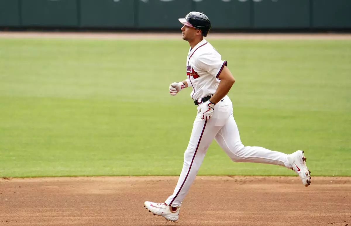 Atlanta Braves' Matt Olson (28) trots the bases on his two-run home run against the Minnesota Twins during the first inning of a baseball game Saturday, April 20, 2025, in Atlanta. (AP Photo/John David Mercer)