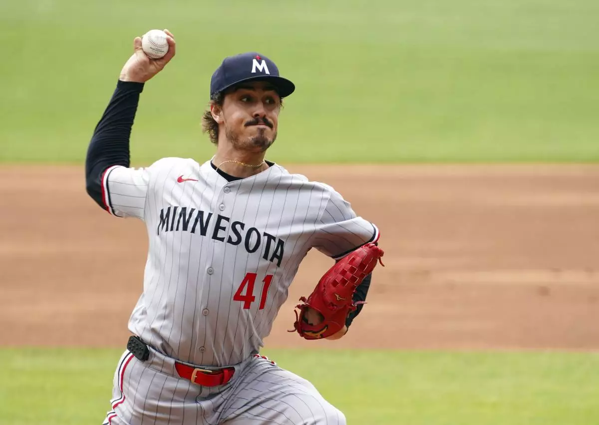 Minnesota Twins pitcher Joe Ryan (41) delivers a pitch against the Atlanta Braves during the first inning of a baseball game Saturday, April 20, 2025, in Atlanta. (AP Photo/John David Mercer)