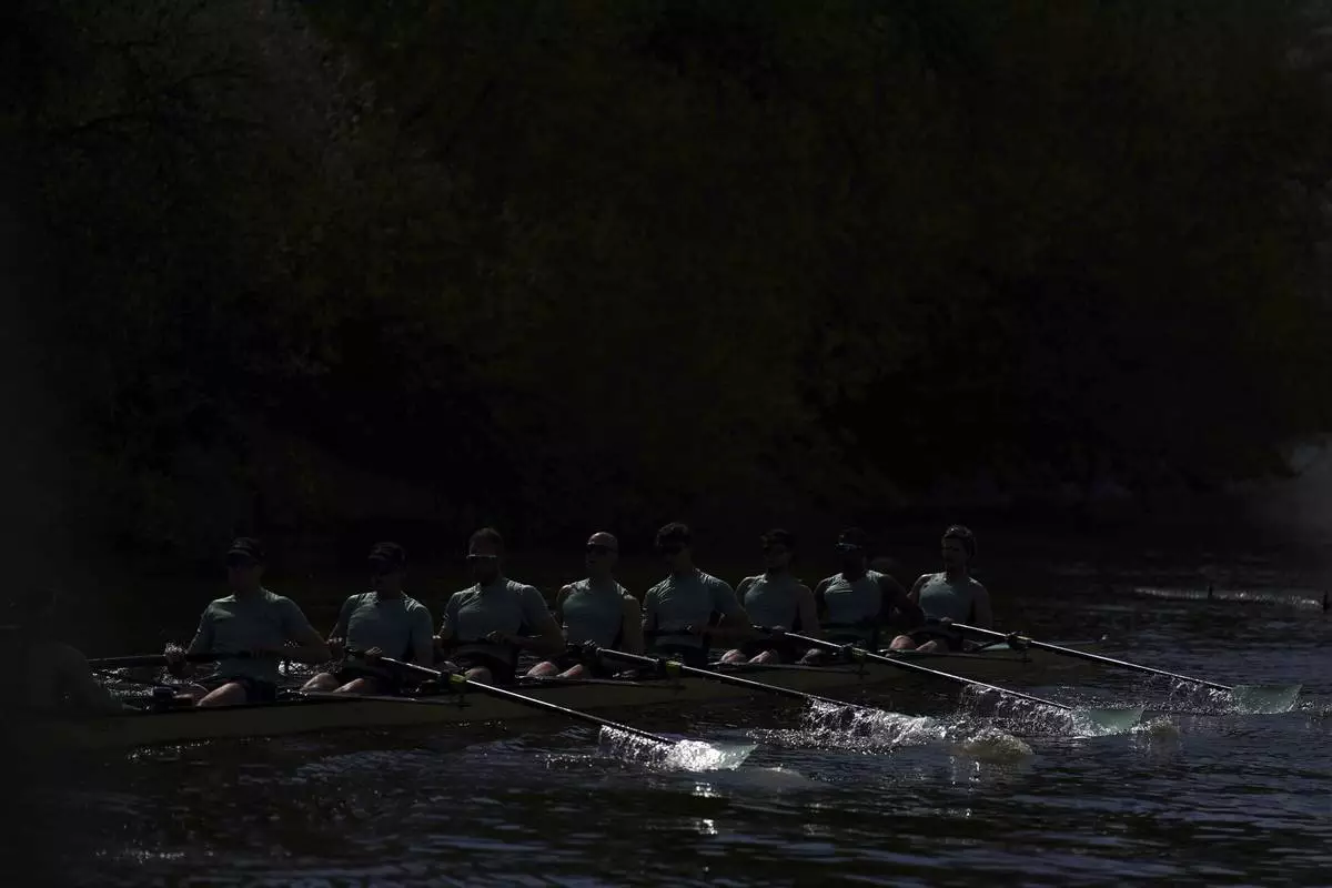 The Cambridge University Men's Boat Team during a training session on the River Thames in London, Tuesday, April 8, 2025. (Zac Goodwin/PA via AP)