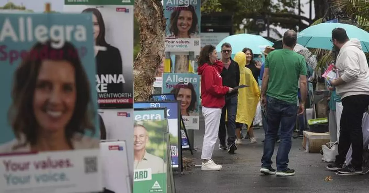 Australians start voting in general elections as pope's death overshadows campaigning