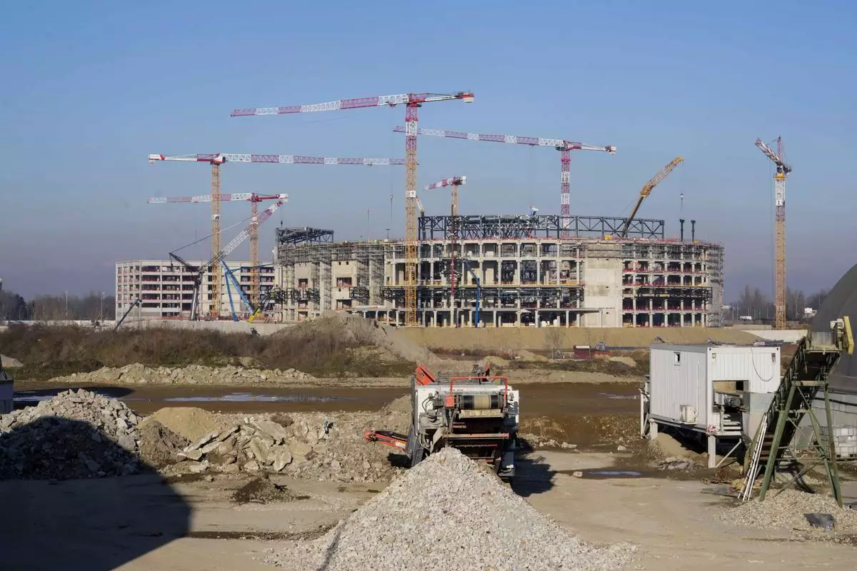The Milano Santagiulia Ice Hockey Arena for the Milan Cortina 2026 Winter Olympics is under construction, in Assago, near Milan, Italy, Wednesday, Jan. 15, 2025. (AP Photo/Luca Bruno)