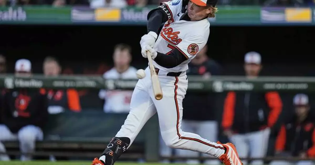 A grand slam for Coconut -- Jackson Holliday hits one with his dog in attendance