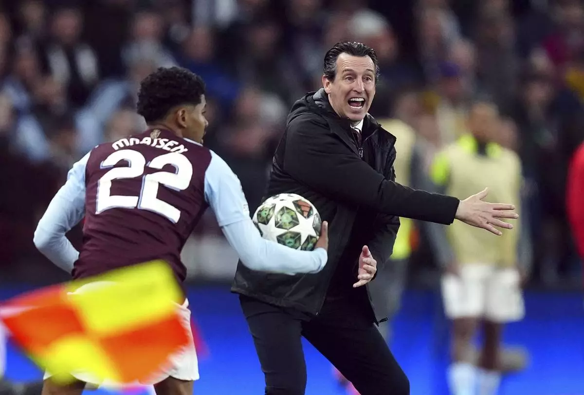 Aston Villa manager Unai Emery gestures during the Champions League quarterfinal second leg soccer match between Aston Villa and Paris Saint-Germain at the Villa Park stadium, in Birmingham, England, Tuesday, April 15, 2025. (David Davies/PA via AP)