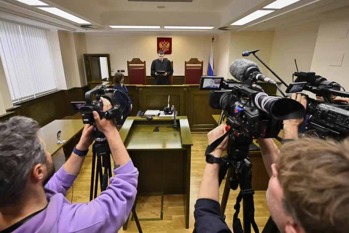 Russia's Supreme Court judge Oleg Nefyodov delivers a verdict lifting a ban on Afghanistan's Taliban, who were designated as a terrorist group more than two decades ago, in Moscow, Russia, Thursday, April 17, 2025. (AP Photo/Dmitry Serebryakov)