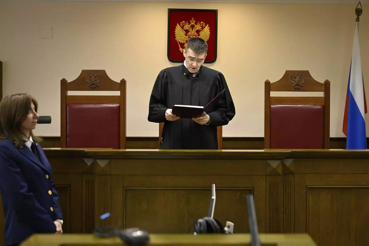 Russia's Supreme Court judge Oleg Nefyodov delivers a verdict lifting a ban on Afghanistan's Taliban, who were designated as a terrorist group more than two decades ago, in Moscow, Russia, Thursday, April 17, 2025. (AP Photo/Dmitry Serebryakov)