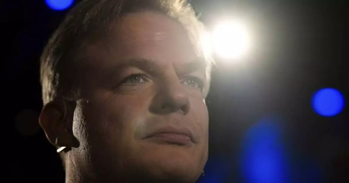 Dutch leader of party in fragile ruling coalition quits politics, citing burnout