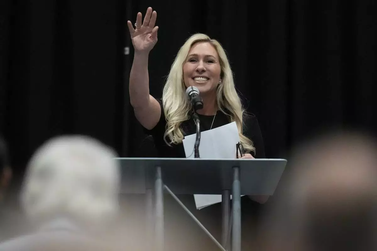 Rep. Marjorie Taylor Greene, R-Ga., speaks during a town-hall style meeting, Tuesday, April 15, 2025, in Acworth, Ga. (AP Photo/Mike Stewart)