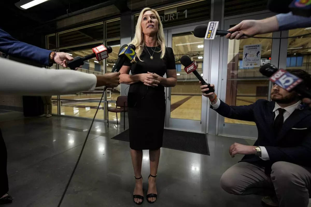 Rep. Marjorie Taylor Greene, R-Ga., speaks after a town-hall style meeting, Tuesday, April 15, 2025, in Acworth, Ga. (AP Photo/Mike Stewart)