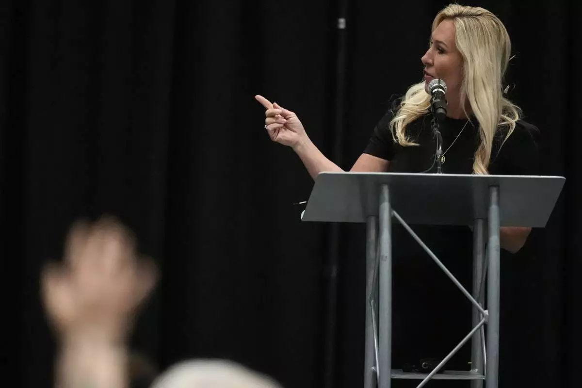 Rep. Marjorie Taylor Greene, R-Ga., speaks during a town-hall style meeting, Tuesday, April 15, 2025, in Acworth, Ga. (AP Photo/Mike Stewart)