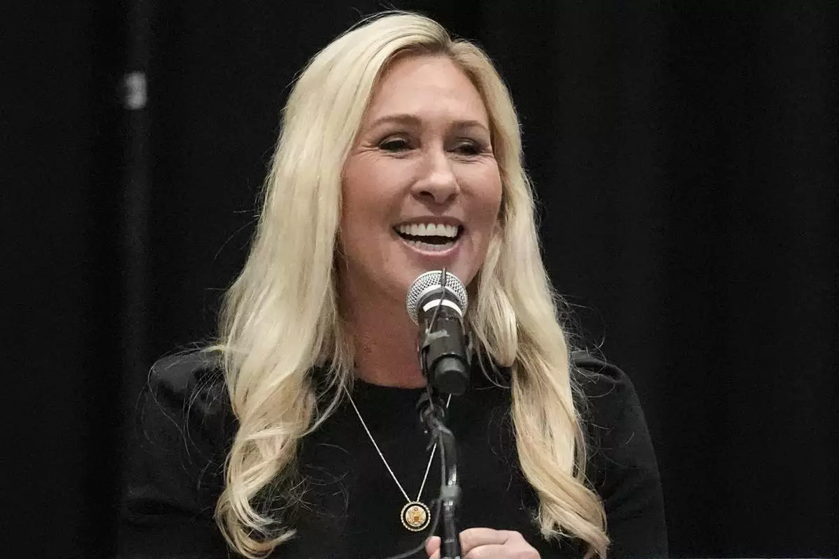 Rep. Marjorie Taylor Greene, R-Ga., speaks during a town-hall style meeting, Tuesday, April 15, 2025, in Acworth, Ga. (AP Photo/Mike Stewart)
