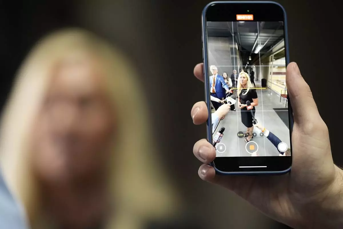 Rep. Marjorie Taylor Greene, R-Ga., speaks after a town-hall style meeting, Tuesday, April 15, 2025, in Acworth, Ga. (AP Photo/Mike Stewart)
