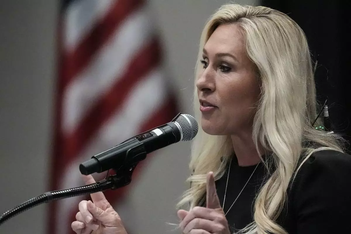 Rep. Marjorie Taylor Greene, R-Ga., speaks during a town-hall style meeting, Tuesday, April 15, 2025, in Acworth, Ga. (AP Photo/Mike Stewart)