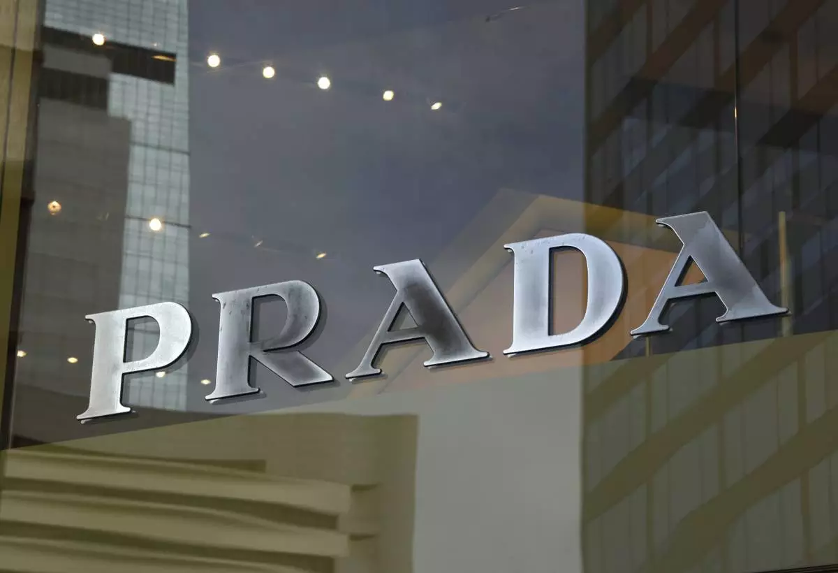 A logo of Prada is seen at a store in Hong Kong Sunday, June 12, 2011. (AP Photo/Vincent Yu, File)