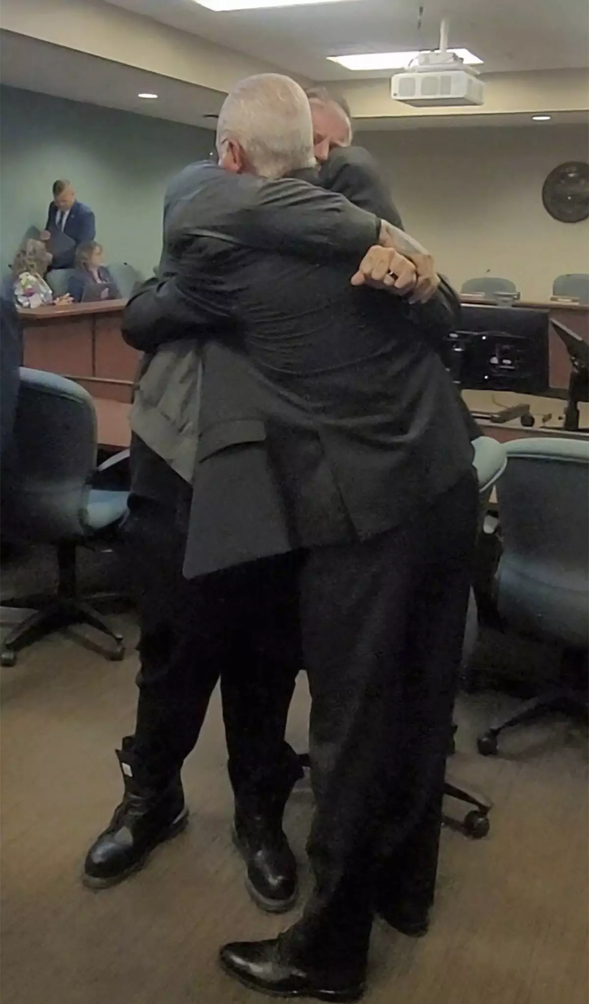 Davidson County Sheriff's Office shows singer Jelly Roll giving a hub to Nashville Sheriff Daron Hall at his Tennessee Board of Parole hearing on Tuesday, April 22, 2025 in Nashville, Tenn. (Davidson County Sheriff's Office via AP)