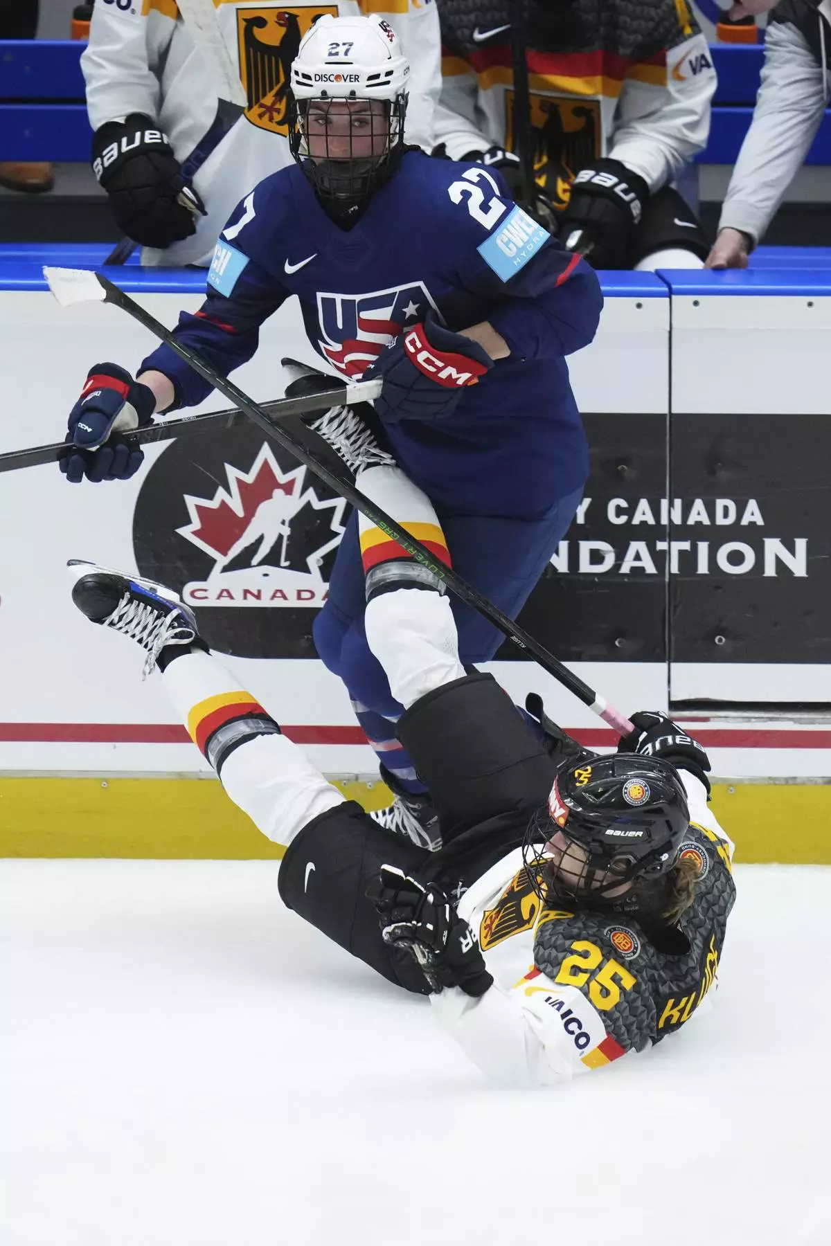 United States' Taylor Heise, back checks Germany's Laura Kluge during the quarterfinal match between United States and Germany at the Women's Ice Hockey Championships in Ceske Budejovice, Czech Republic, Thursday, April 17, 2025. (AP Photo/Petr David Josek)