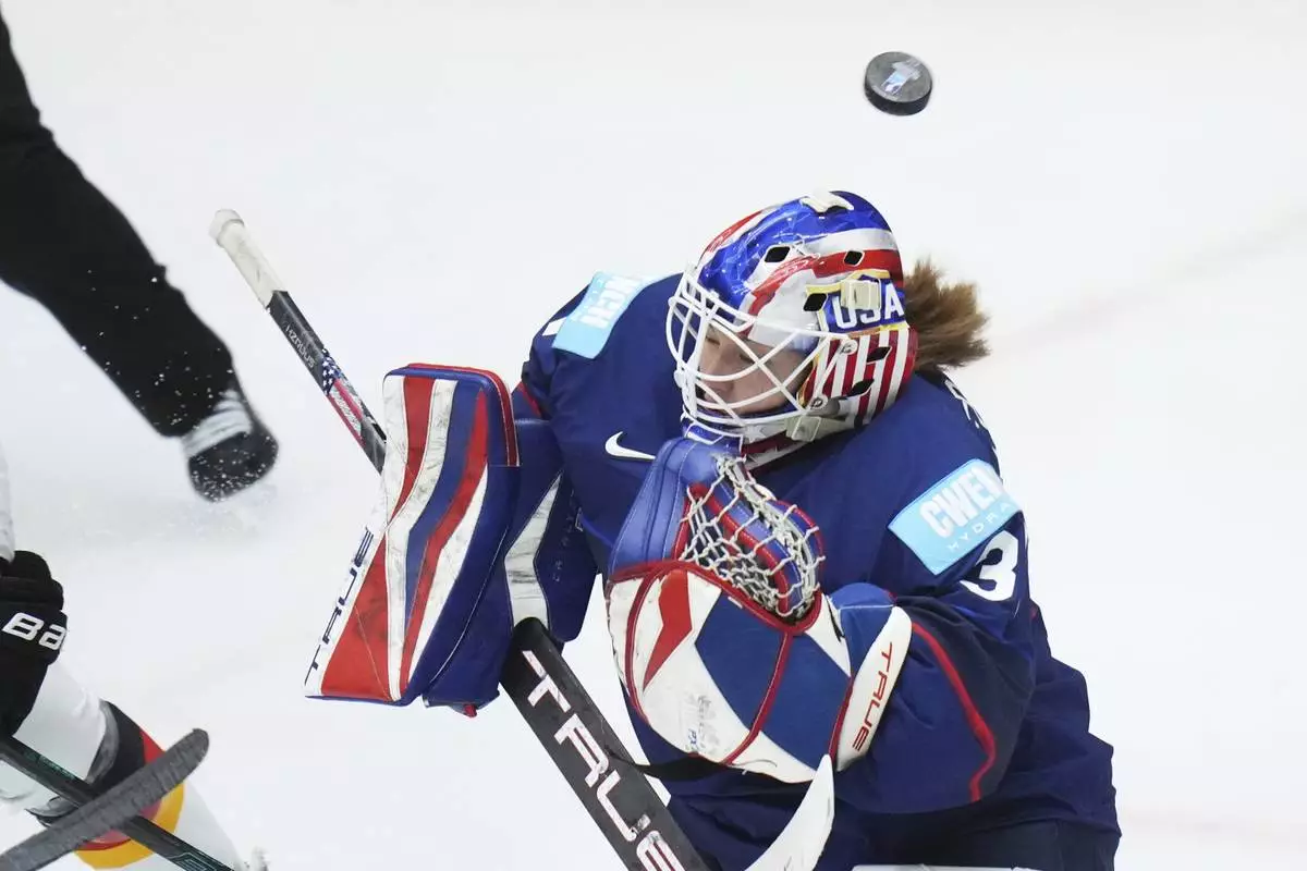 United States' Aerin Frankel makes a save during the quarterfinal match between United States and Germany at the Women's Ice Hockey Championships in Ceske Budejovice, Czech Republic, Thursday, April 17, 2025. (AP Photo/Petr David Josek)