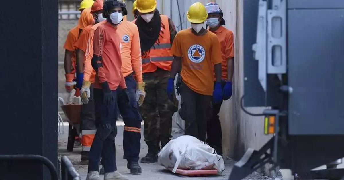 Burials begin as the search ends for victims in the Dominican nightclub collapse that killed 221