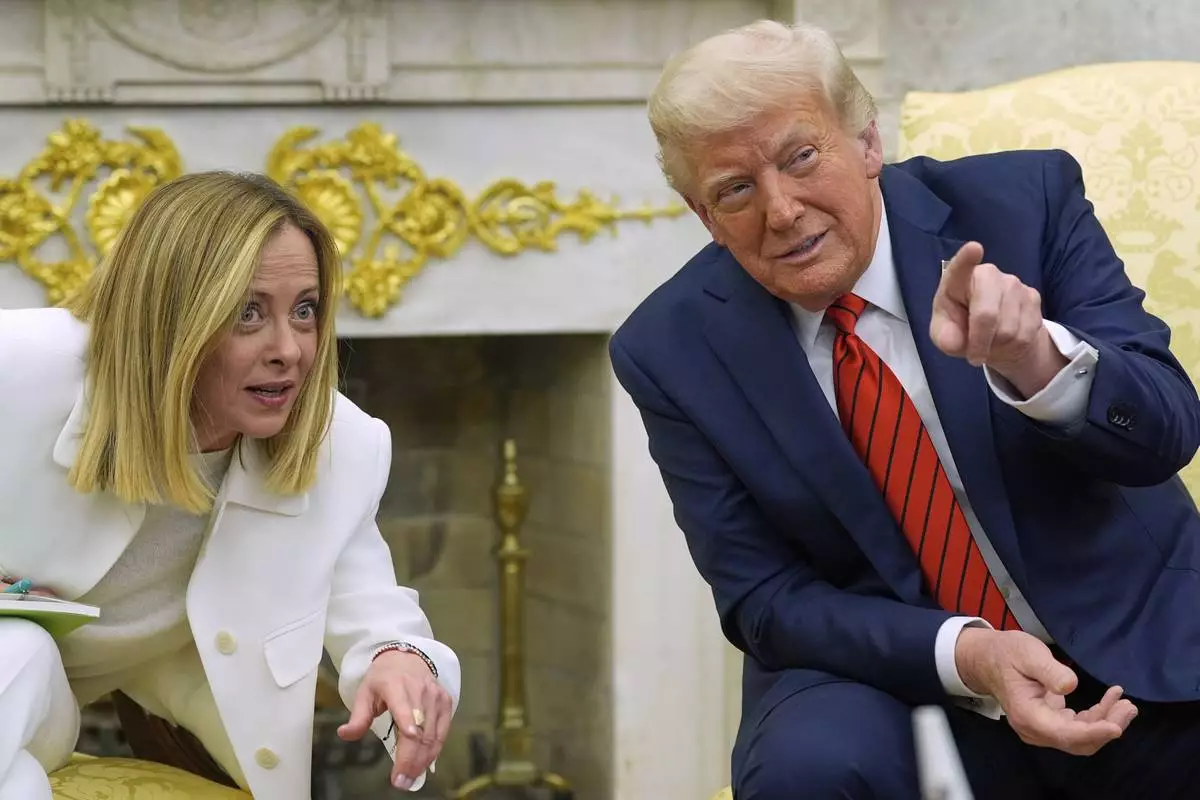 President Donald Trump meets with Italy's Prime Minister Giorgia Meloni in the Oval Office of the White House, Thursday, April 17, 2025, in Washington. (AP Photo/Alex Brandon)