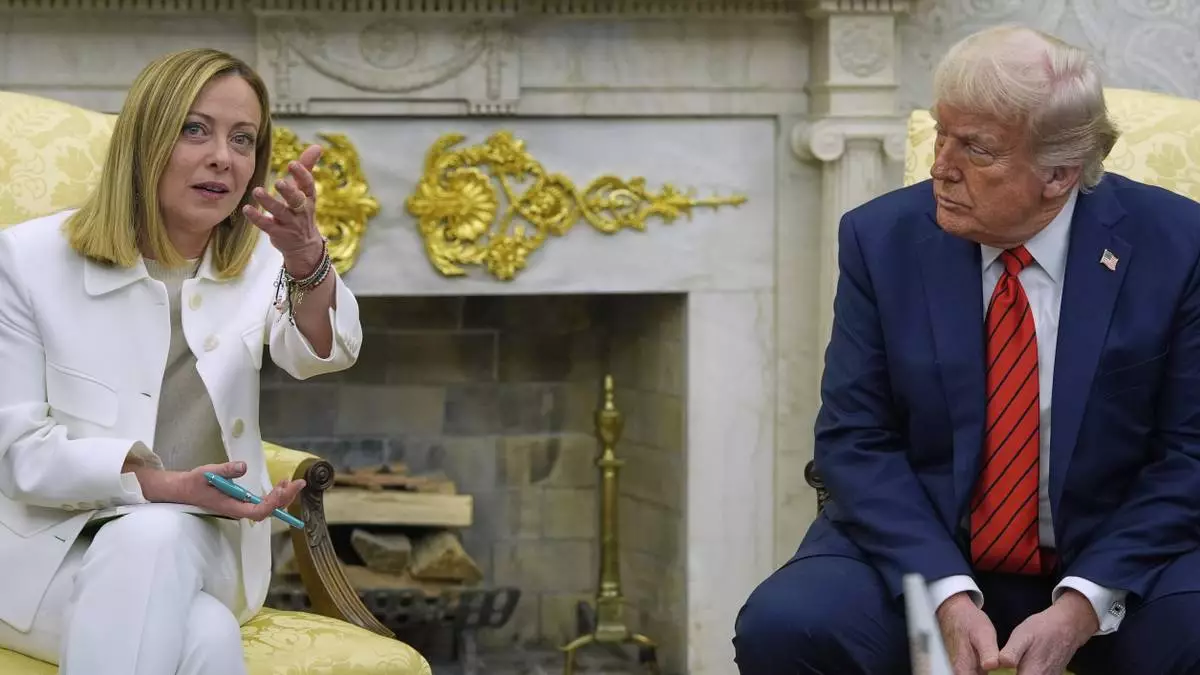 President Donald Trump meets with Italy's Prime Minister Giorgia Meloni in the Oval Office of the White House, Thursday, April 17, 2025, in Washington. (AP Photo/Alex Brandon)