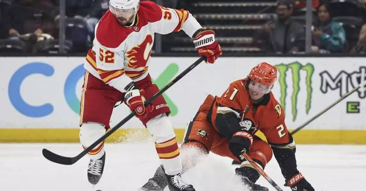 Gauthier scores late in 3rd and in OT to lift the Ducks past the Flames, 4-3