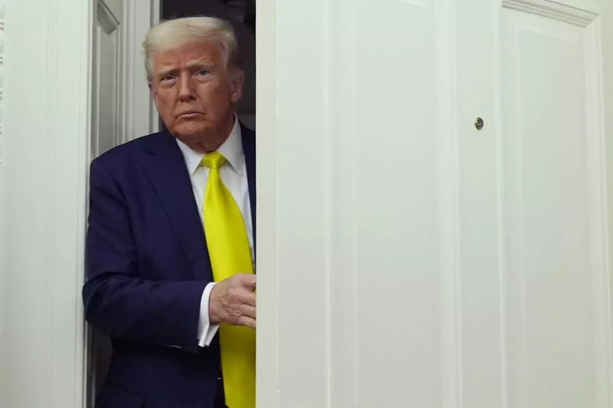 President Donald Trump arrives at a swearing in ceremony for Dr. Mehmet Oz to be Administrator of the Centers for Medicare and Medicaid Services, in the Oval Office of the White House, Friday, April 18, 2025, in Washington. (AP Photo/Alex Brandon)