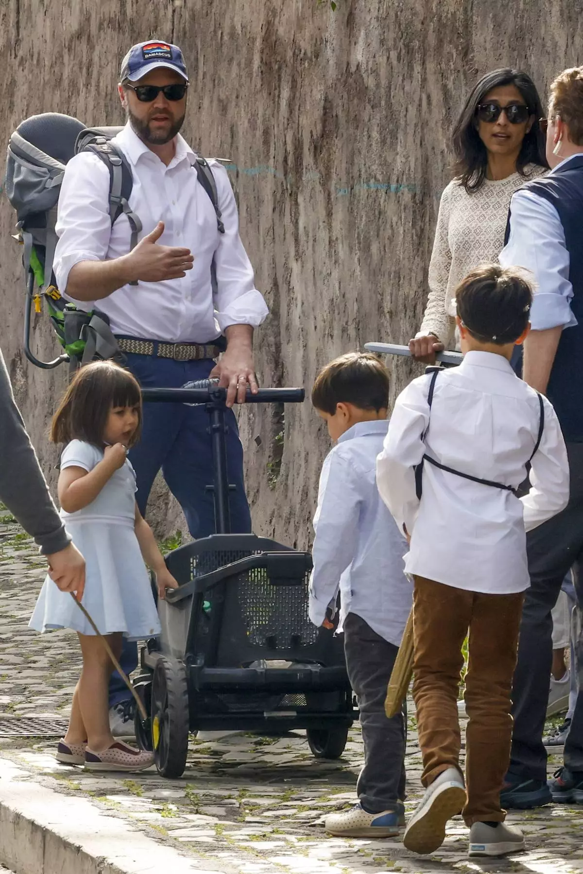 US Vice President J.D. Vance leaves Rome's Botanic Gardens with his wife Usha, right, their daughter Mirabel, left, and sons Vivek and Ewan, back to camera, Saturday, April 19, 2025. (AP Photo/Riccardo De Luca)