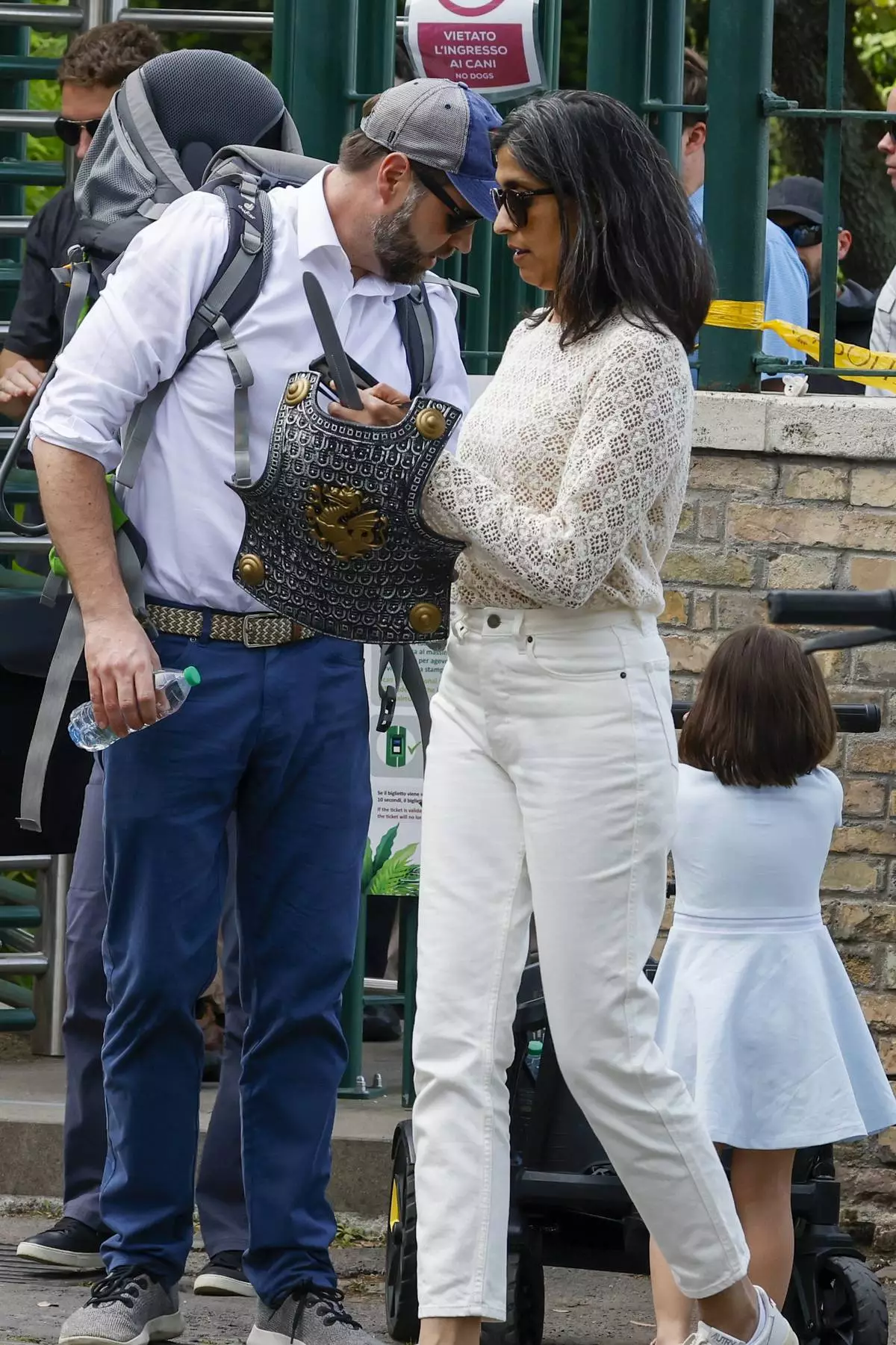 US Vice President J.D. Vance leaves Rome's Botanic Gardens with his wife Usha, center, and their daughter Mirabel, back to camera, Saturday, April 19, 2025. (AP Photo/Riccardo De Luca)