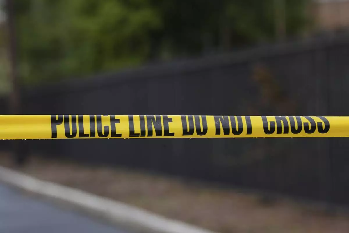 Police tape cordons off an area outside Pennsylvania governor's official residence in Harrisburg, Pa., Monday, April 14, 2025. (AP Photo/Matt Rourke)