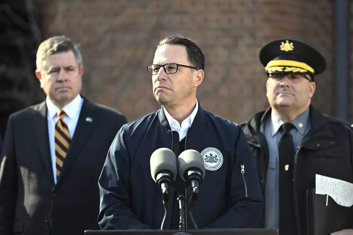 Pennsylvania Gov. Josh Shapiro pauses during a news conference at the governor's official residence discussing the alleged arson that forced him, his family and guests to flee in the middle of the night on the Jewish holiday of Passover, Sunday, Apr. 13, 2025, in Harrisburg, Pa. (AP Photo/Marc Levy)
