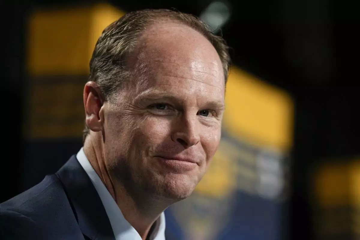 FILE - Buffalo Sabres general manager Kevyn Adams resounds to questions after the second day of the NHL hockey draft, June 29, 2023, in Nashville, Tenn. (AP Photo/George Walker IV, File)