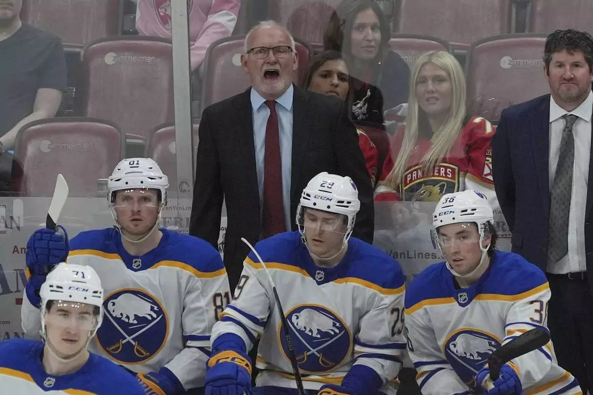 Buffalo Sabres head coach Lindy Ruff gestures during the second period of an NHL hockey game against the Florida Panthers, Saturday, April 12, 2025, in Sunrise, Fla. (AP Photo/Marta Lavandier)