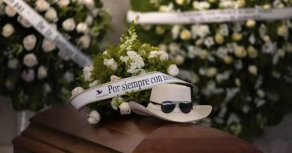 Mourners pay tribute to merengue icon Rubby Pérez, who died in the Dominican roof collapse