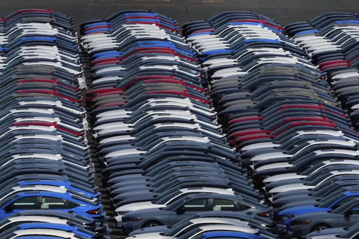 Export vehicles are parked atthe Daikoku Pier in Yokohama, near Tokyo, April 8, 2025. (AP Photo/Hiro Komae)