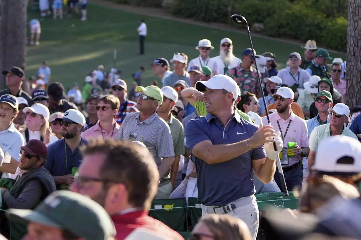 Rory McIlroy, of Northern Ireland, watches his tee shot on the 17th hole during the final round at the Masters golf tournament, Sunday, April 13, 2025, in Augusta, Ga. (AP Photo/Julia Demaree Nikhinson)