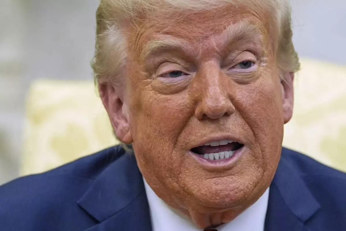President Donald Trump speaks as he meets with Italy's Prime Minister Giorgia Meloni in the Oval Office of the White House, Thursday, April 17, 2025, in Washington. (AP Photo/Alex Brandon)