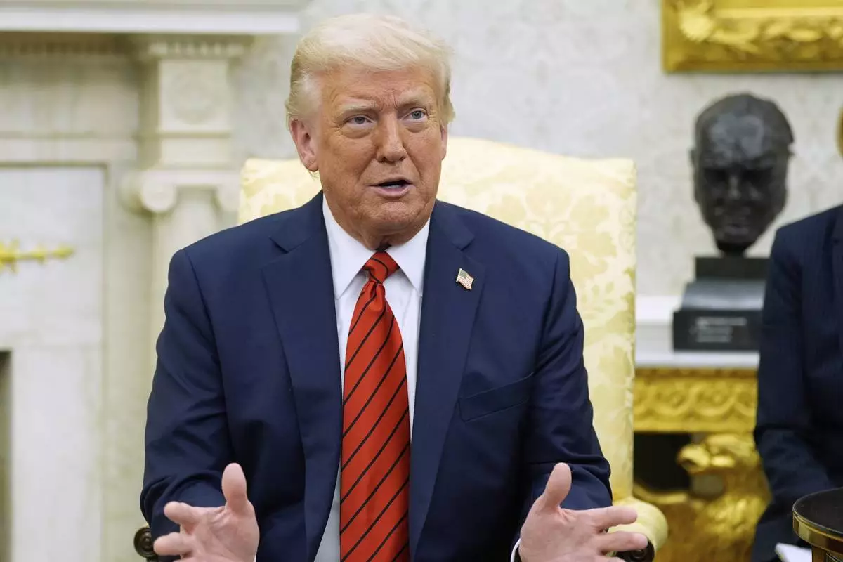President Donald Trump speaks as he meets with Italy's Prime Minister Giorgia Meloni in the Oval Office of the White House, Thursday, April 17, 2025, in Washington. (AP Photo/Alex Brandon)