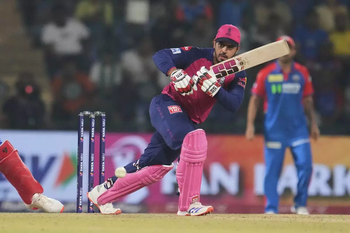 Rajasthan Royals' Nitish Rana plays a shot during the Indian Premier League cricket match between Delhi Capitals and Rajasthan Royals at Arun Jaitley Stadium in New Delhi, India, Wednesday, April 16, 2025. (AP Photo/Manish Swarup)