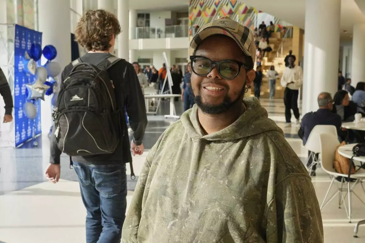 Case Western Reserve University student. Justen Pippens poses for a photo in the student union at the school In Cleveland Thursday, April 17, 2025. (AP Photo/Sue Ogrocki)