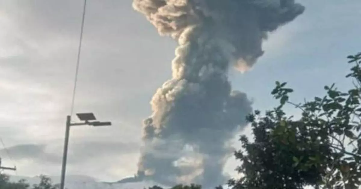 Philippine volcano spews ash plume into the sky, prompting school closures