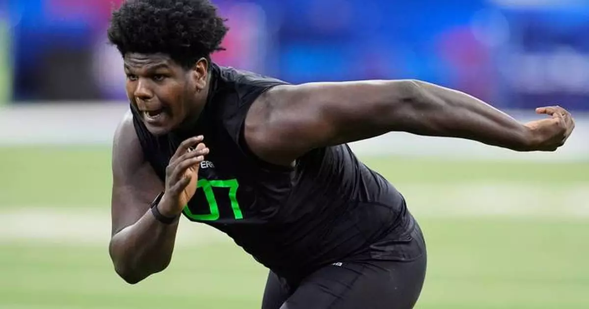 Commanders take Oregon offensive tackle Josh Conerly Jr. with the 29th pick in the NFL draft