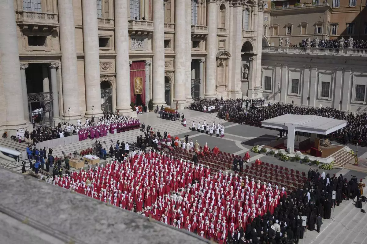 Pallbearers carry the coffin during the funeral of Pope Francis in St. Peter's Square at the Vatican, Saturday, April 26, 2025. (AP Photo/Markus Schreiber)