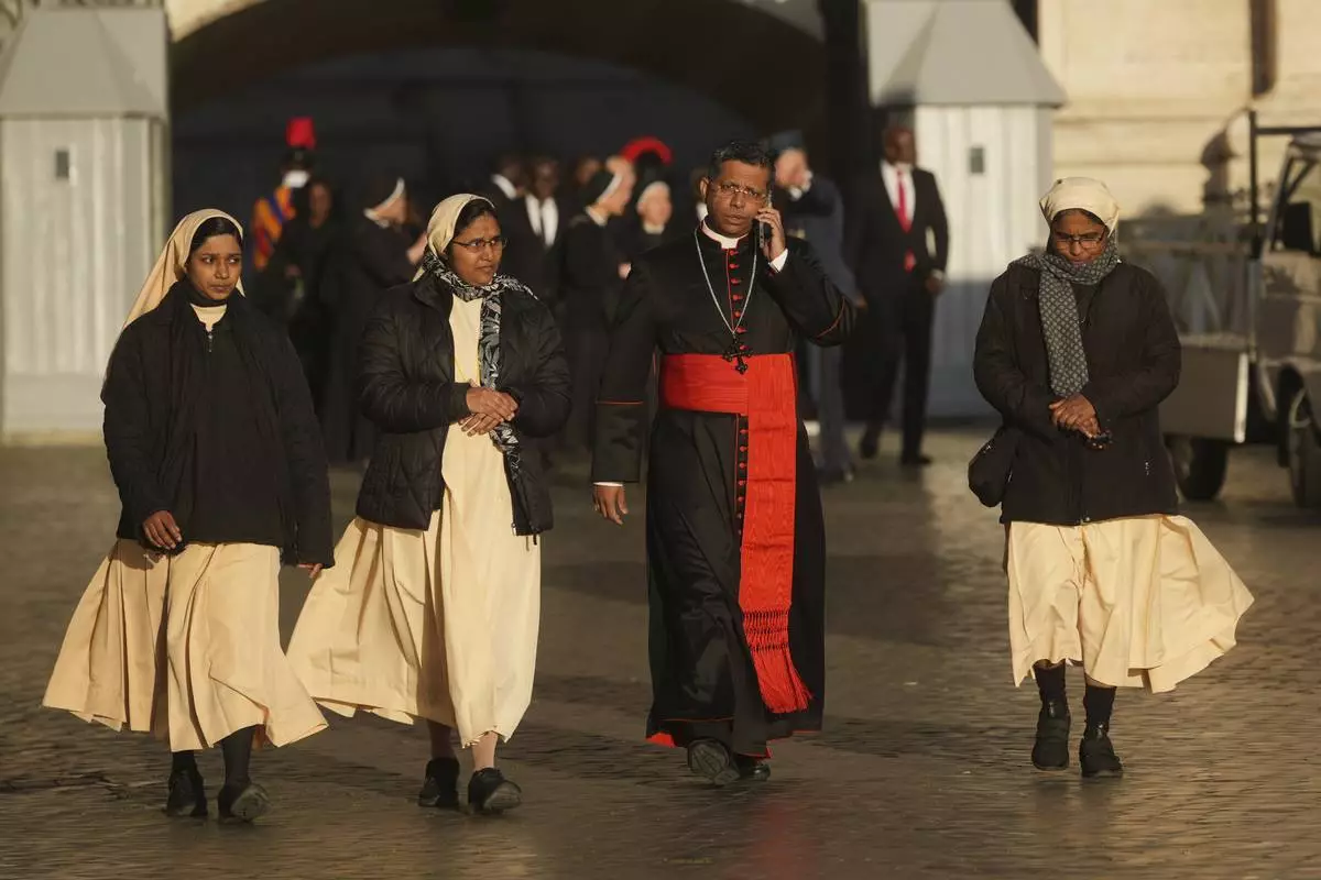 Cardinal George Jakob Koovakad, second from right, arrives for the funeral of Pope Francis in St. Peter's Square at the Vatican, Saturday, April 26, 2025. (AP Photo/Alessandra Tarantino)
