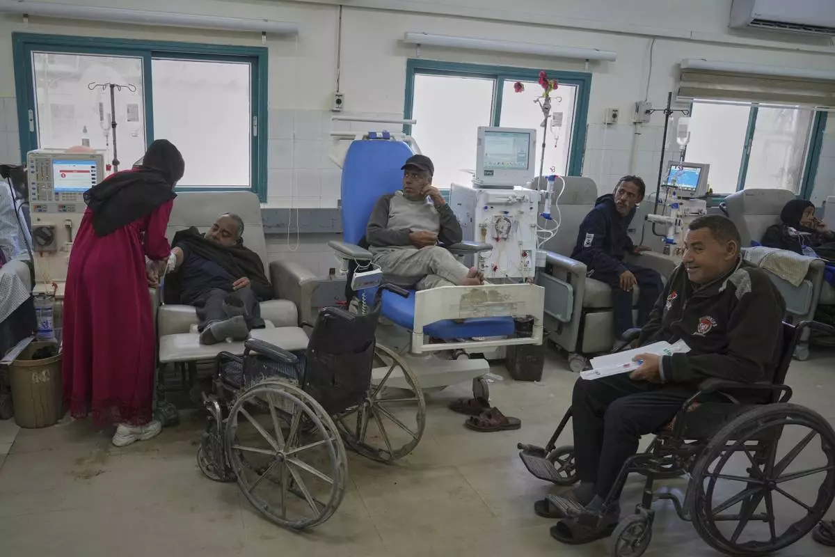 Mohamed Attiya, 54, second from left, receives dialysis treatment at Shifa hospital in Gaza City, Monday, April 14, 2025.(AP Photo/(AP Photo/Jehad Alshrafi)