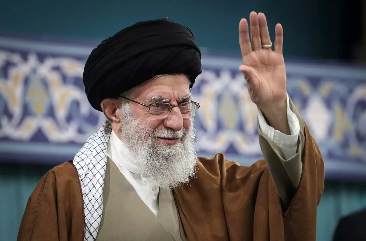 FILE - In this photo released by the office of the Iranian supreme leader, Supreme Leader Ayatollah Ali Khamenei waves to the crowd during a meeting with officials, Islamic countries' ambassador to Iran and a group of people in Tehran, Iran, March 31, 2025. (Office of the Iranian Supreme Leader via AP, File)
