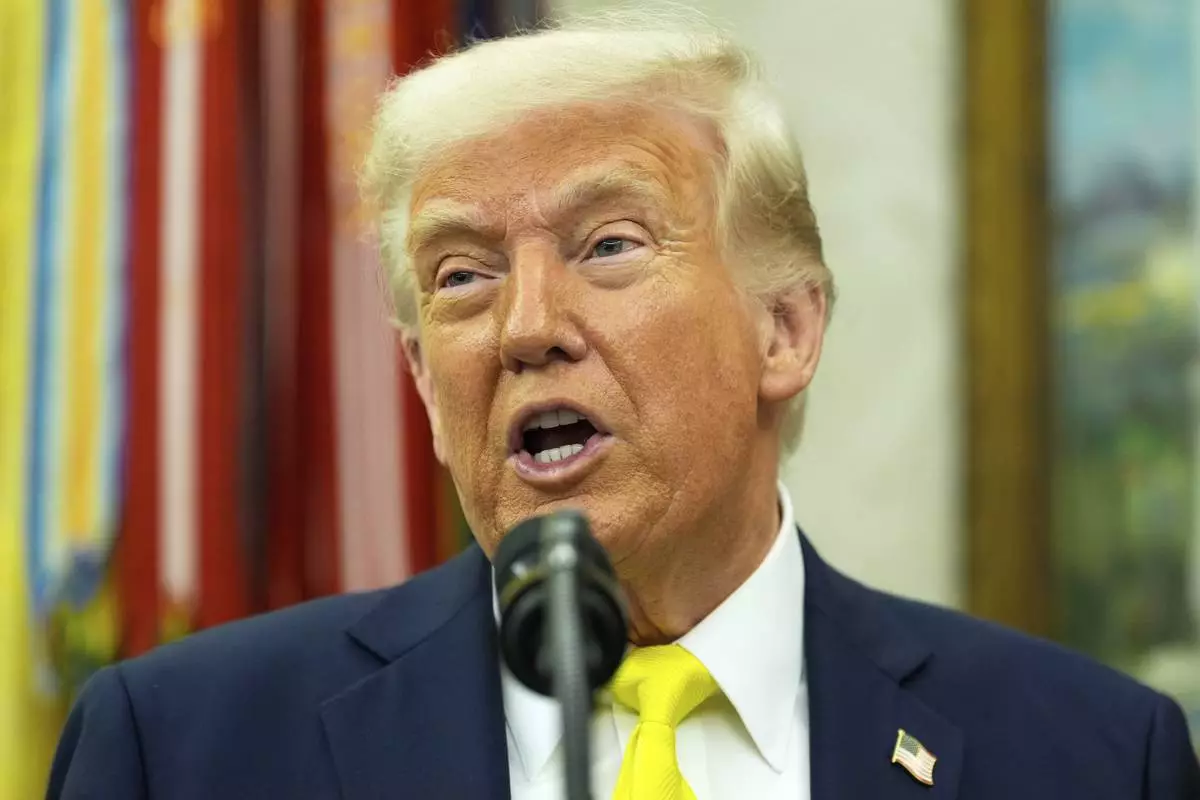 President Donald Trump speaks with reporters during a swearing in ceremony for Dr. Mehmet Oz to be Administrator of the Centers for Medicare and Medicaid Services, in the Oval Office of the White House, Friday, April 18, 2025, in Washington. (AP Photo/Alex Brandon)