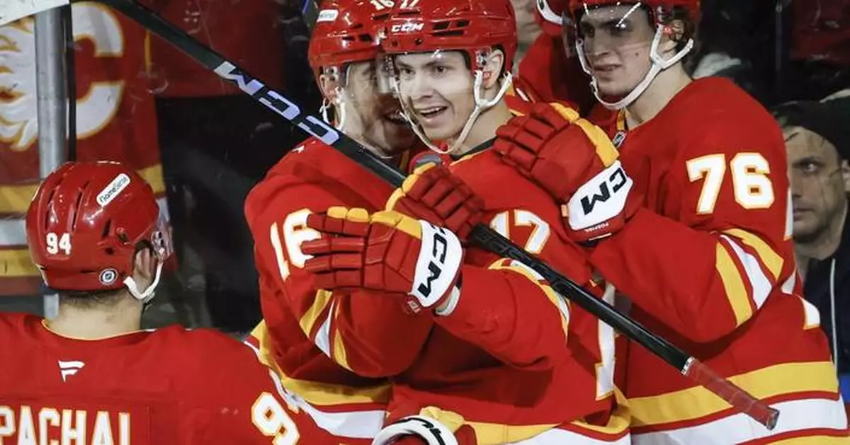 Flames beat Minnesota 4-2 to prevent the Wild from clinching a playoff spot