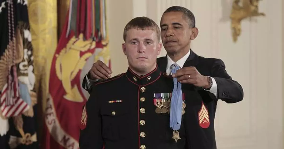 Afghanistan Medal of Honor recipient reenlists in Marine Corps reserves after 15 years