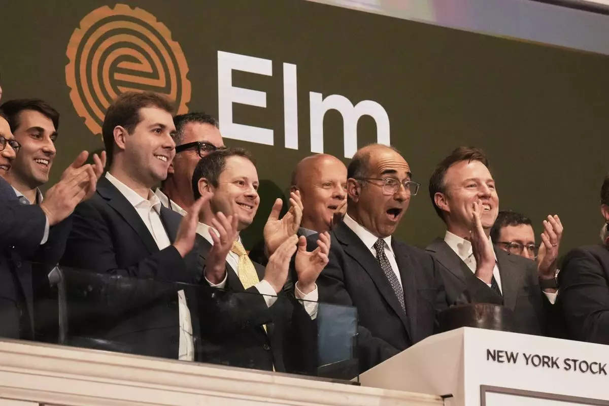 Elm Market Navigator ETF Founder &amp; CIO Victor Haghani, second from right, rings the New York Stock Exchange opening bell, Wednesday, April 23, 2025. (AP Photo/Richard Drew)