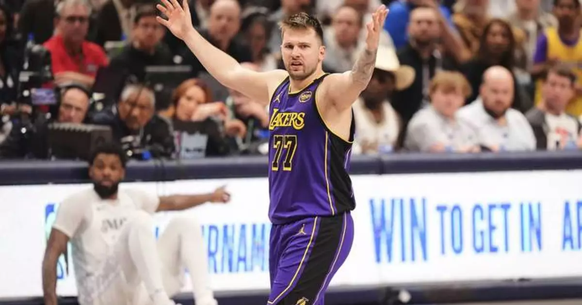 Luka Doncic scores 45 points in Dallas return as Lakers clinch playoff spot with 112-97 win