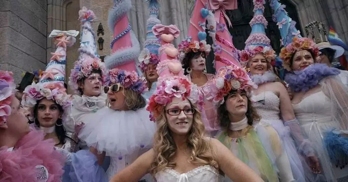 AP PHOTOS: Colorful hats and costumes light up annual NYC Easter Parade